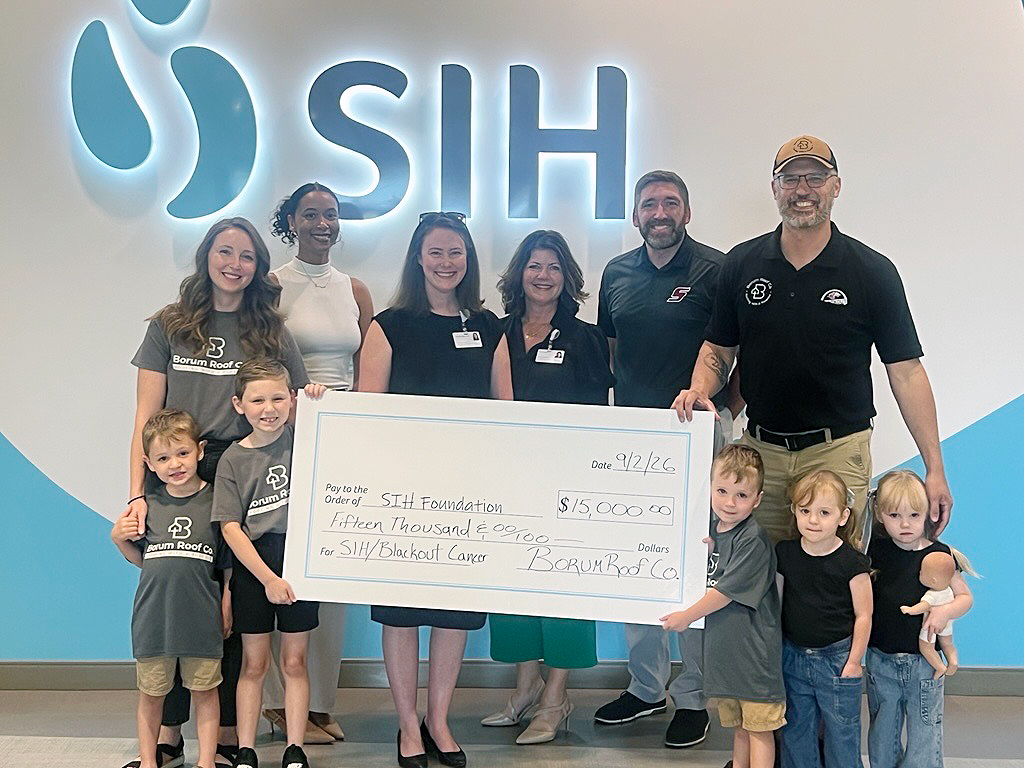 SIH Foundation receives donation from Borum Roof Co. for the Salukis Black Out Cancer Fund
