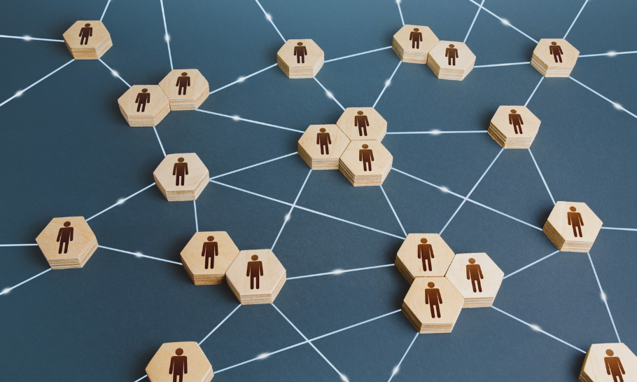a web connecting tiles of human icons.